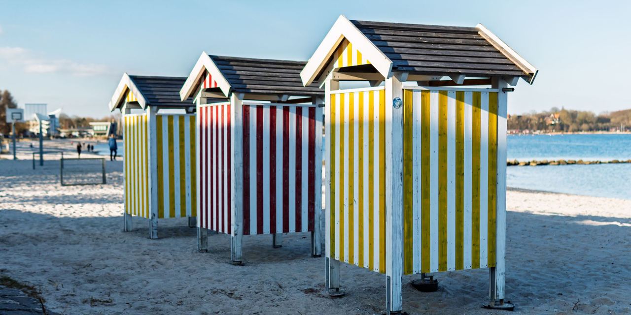 Colorful beach huts | Source: Pexels