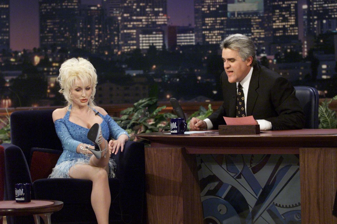 Dolly Parton during an interview with host Jay Leno. | Source: Getty Images