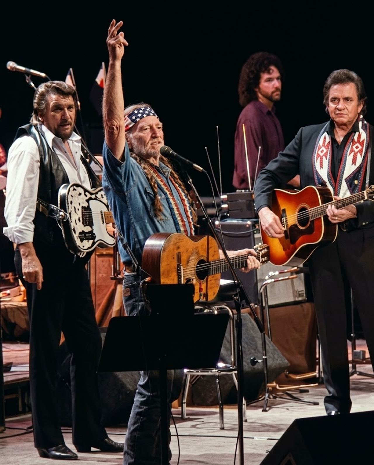 Four distinct legends shared one microphone stand at Nassau Coliseum in 1990, proving outlaw country belonged anywhere p