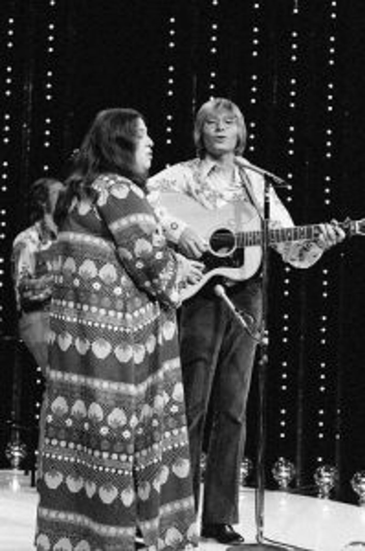 Get ready for goosebumps hearing late greats John Denver and Cass Elliot’s live duet on “Leaving on a Jet Plane” – this