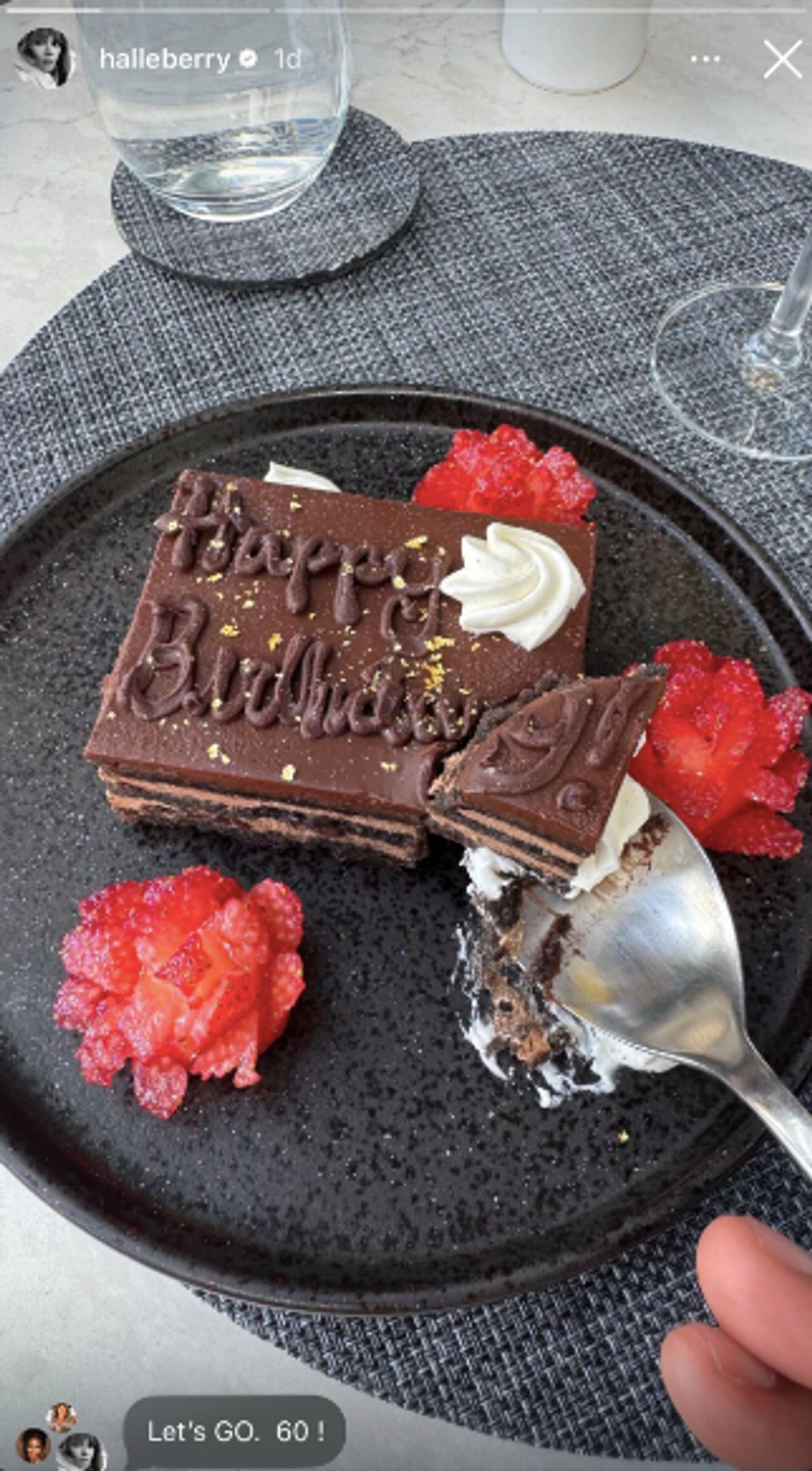 Halle Berry marked her milestone birthday with a decadent chocolate cake topped with strawberries and a simple "Happy Birthday" message. Her "Let's Go. 60!" note made it clear she was more than ready to embrace the next chapter. | Source: Instagram/halleberry