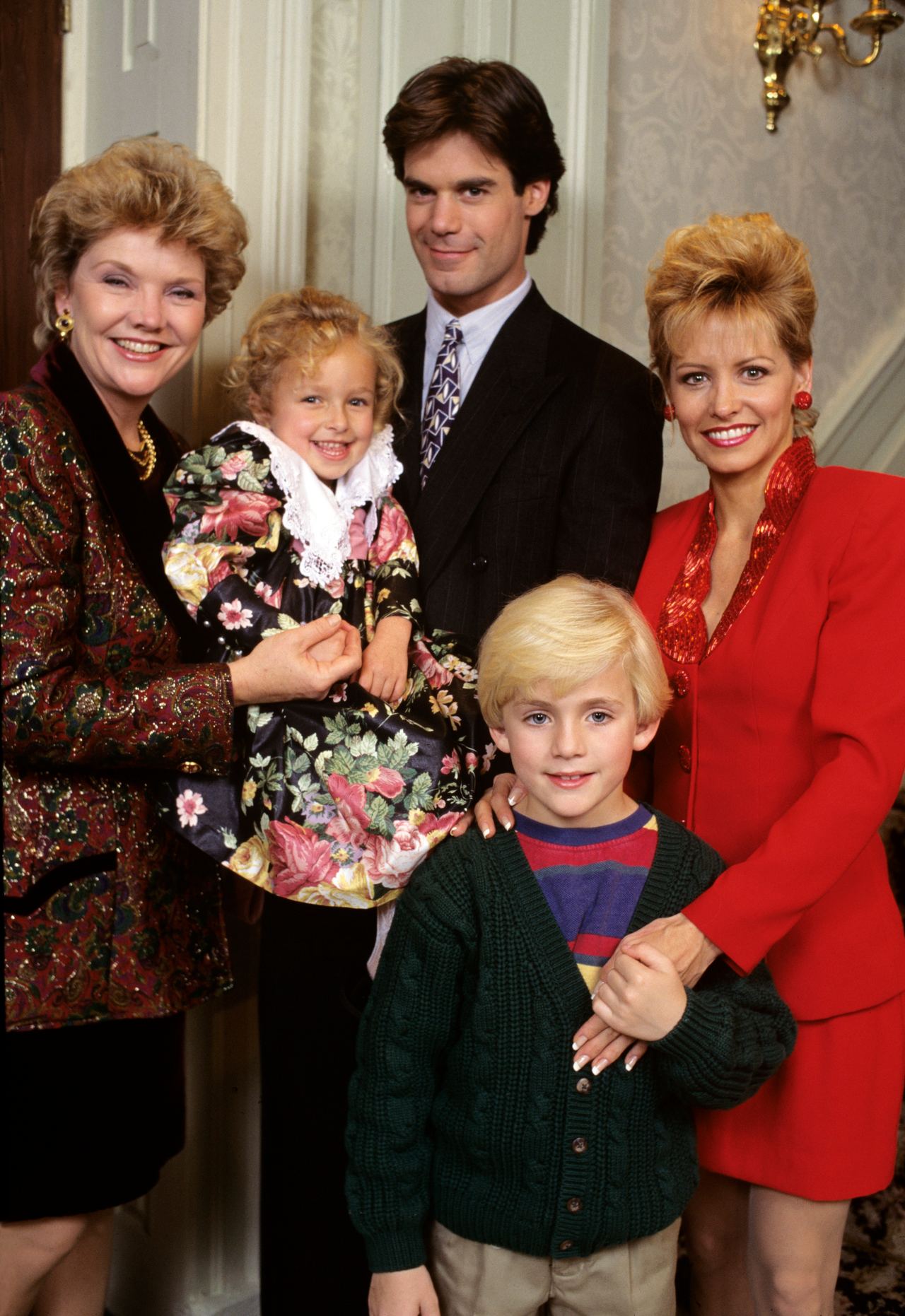 Hayden Panettiere, who started acting before she was barely a year old, touched audiences from an early age during her time on daytime television. In this photo, she posed with Erika Slezak, Tuc Watkins, Tyler Noyes, and Krista Tesreau for a promotional gallery shoot for "One Life to Live" on November 23, 1994. | Source: Getty Images