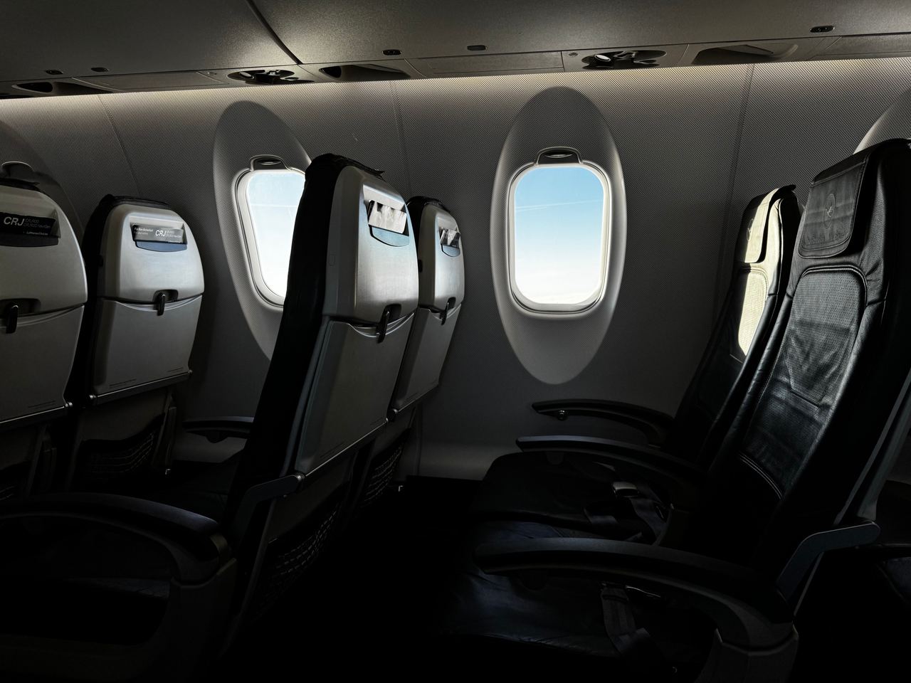 Interior of an empty airplane cabin | Source: Pexels