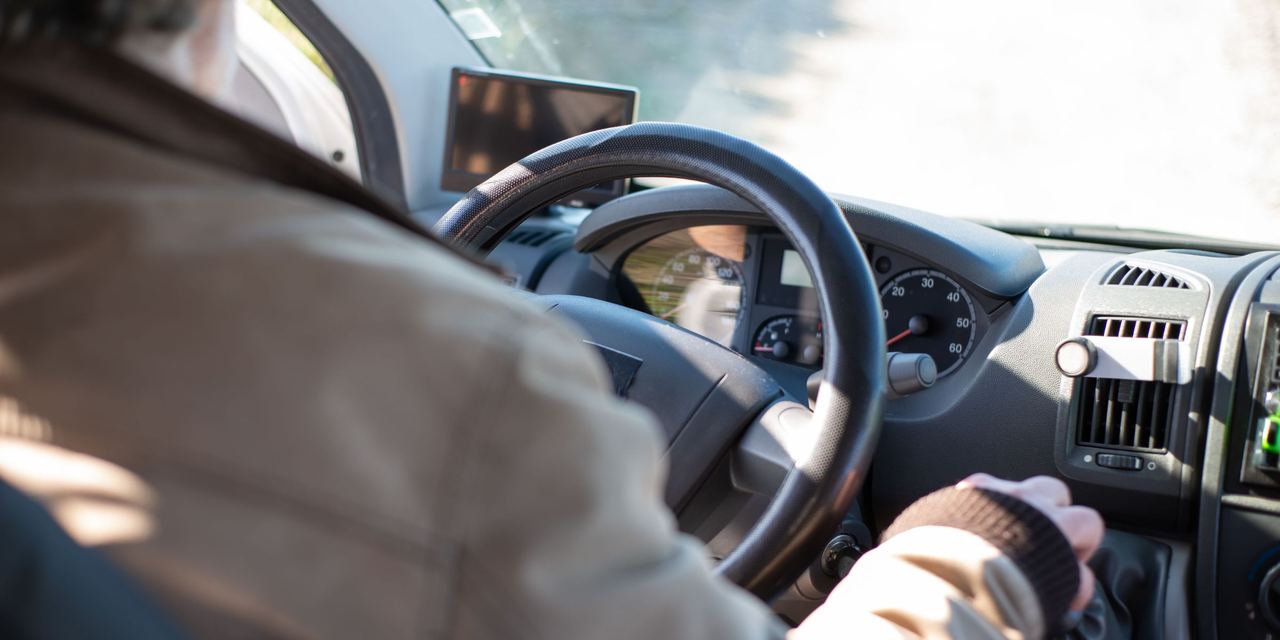 A close-up of a person driving a car | Source: Pexels