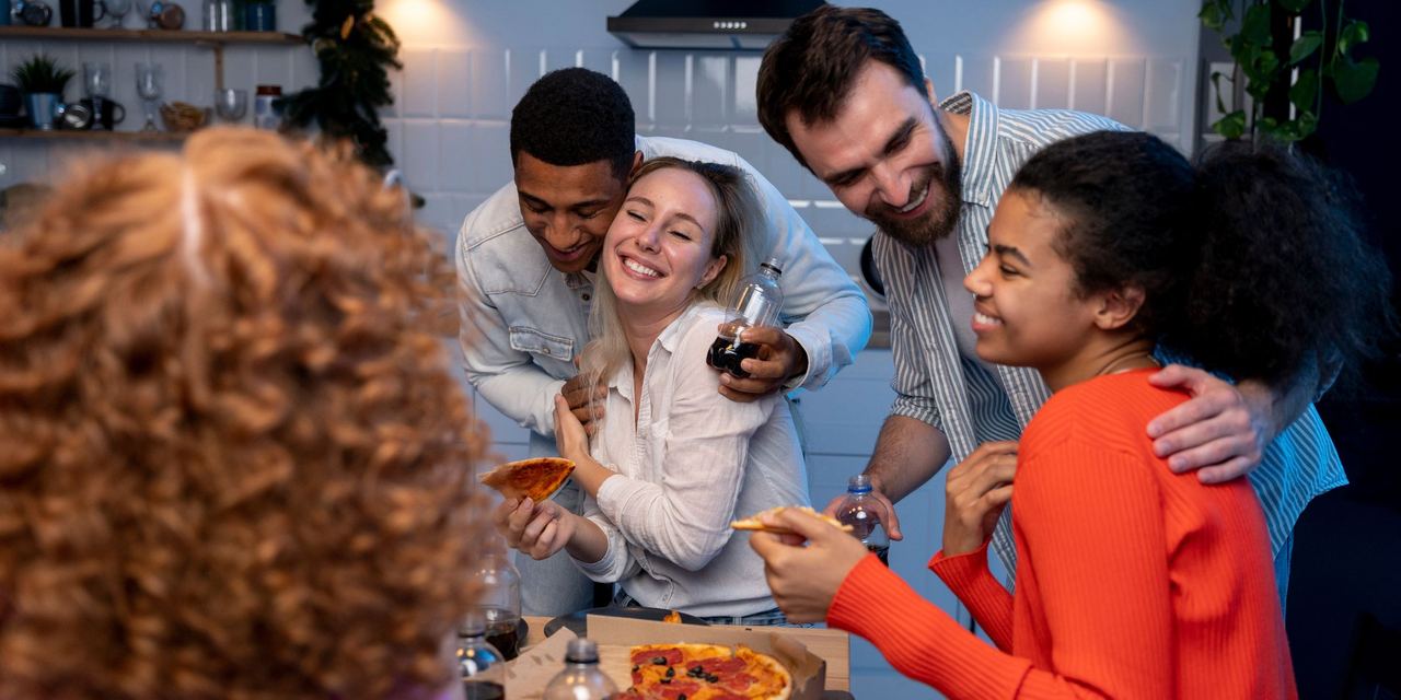 A group of friends at a party | Source: Magnific