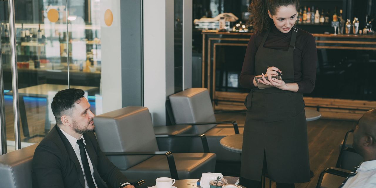 A waitress taking an order at a restaurant | Source: Pexels