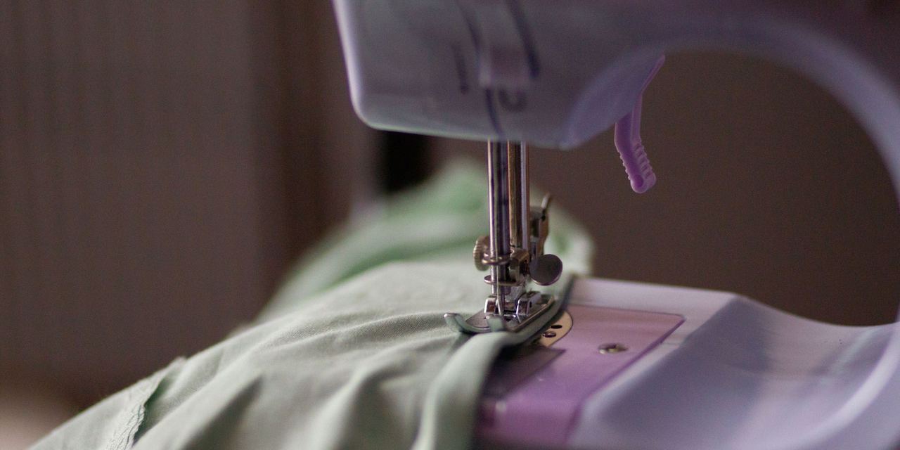 A sewing machine needle stitching | Source: Pexels