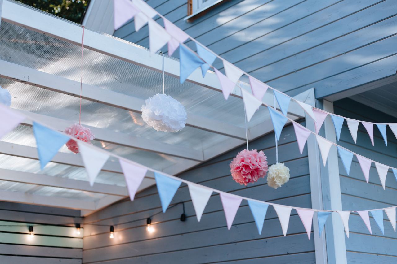 Pastel bunting and pom-poms decoration | Source: Pexels