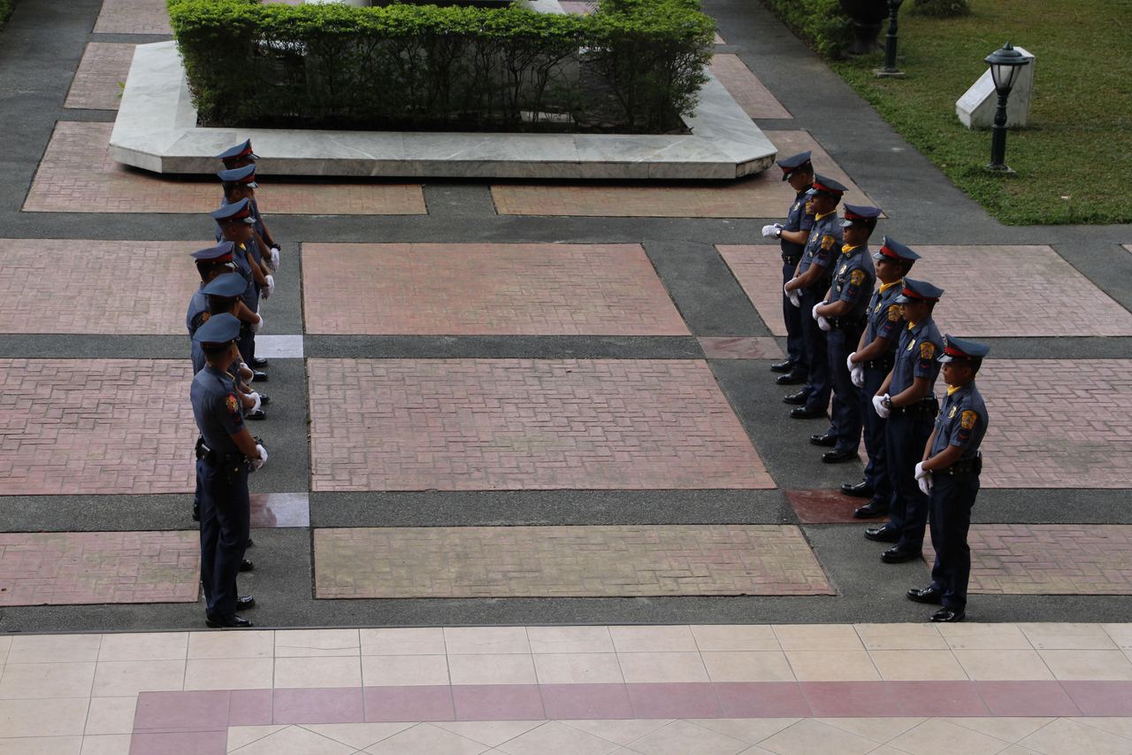 Police personnel standing at attention | Source: Pexels