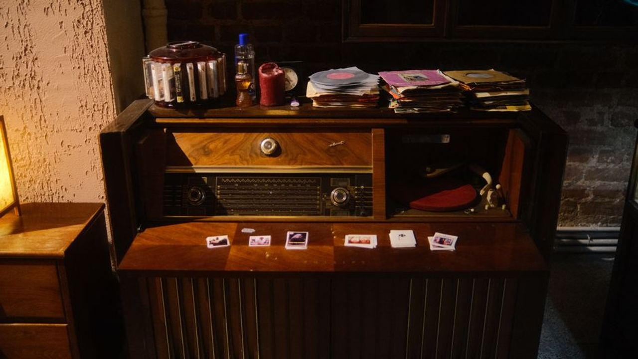 A cozy indoor scene featuring a vintage radio console with vinyl records, embodying nostalgic vibes.