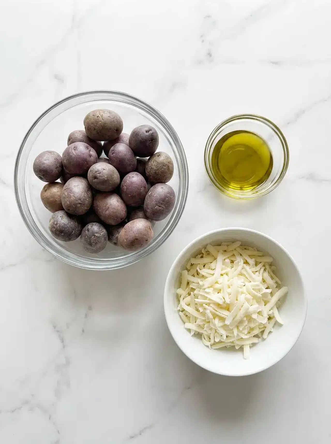 3-Ingredient Cheesy Roasted Purple Potatoes