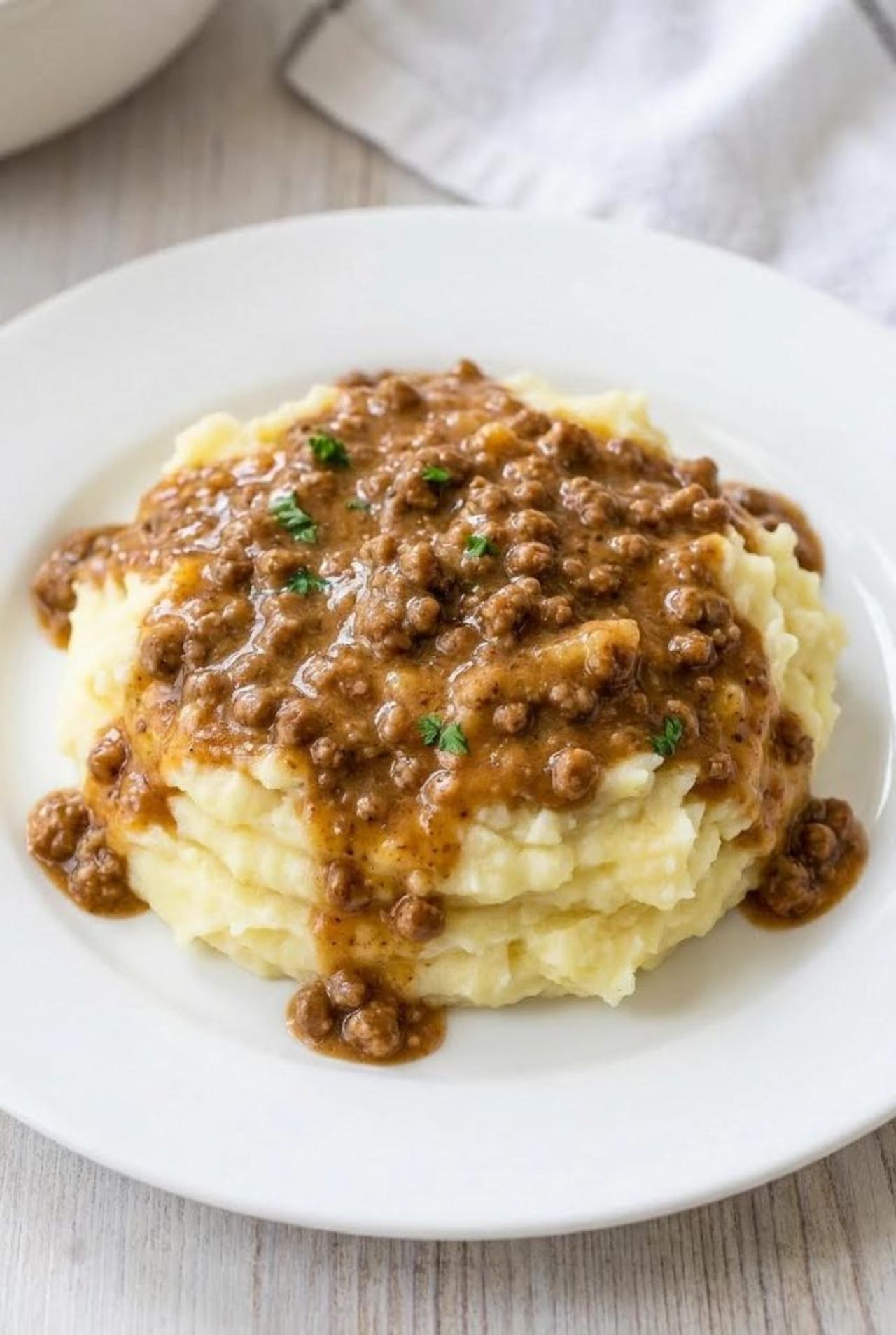 Ground Beef and Gravy Over Mashed Potatoes