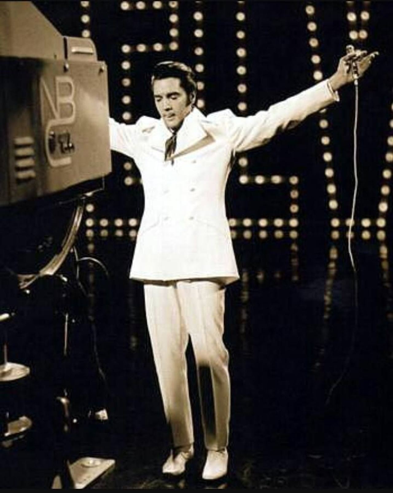 A different moment from Elvis Presley's 1968 television finale. Archival television still.