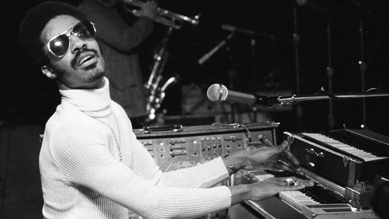 Stevie Wonder singing and playing keyboards during a 1974 television concert.