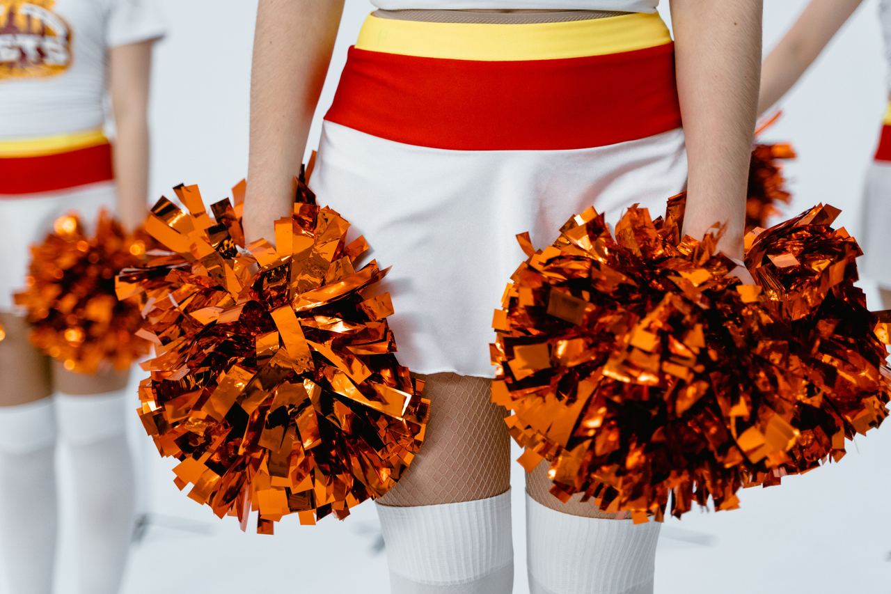 A girl with pompoms | Source: Pexels