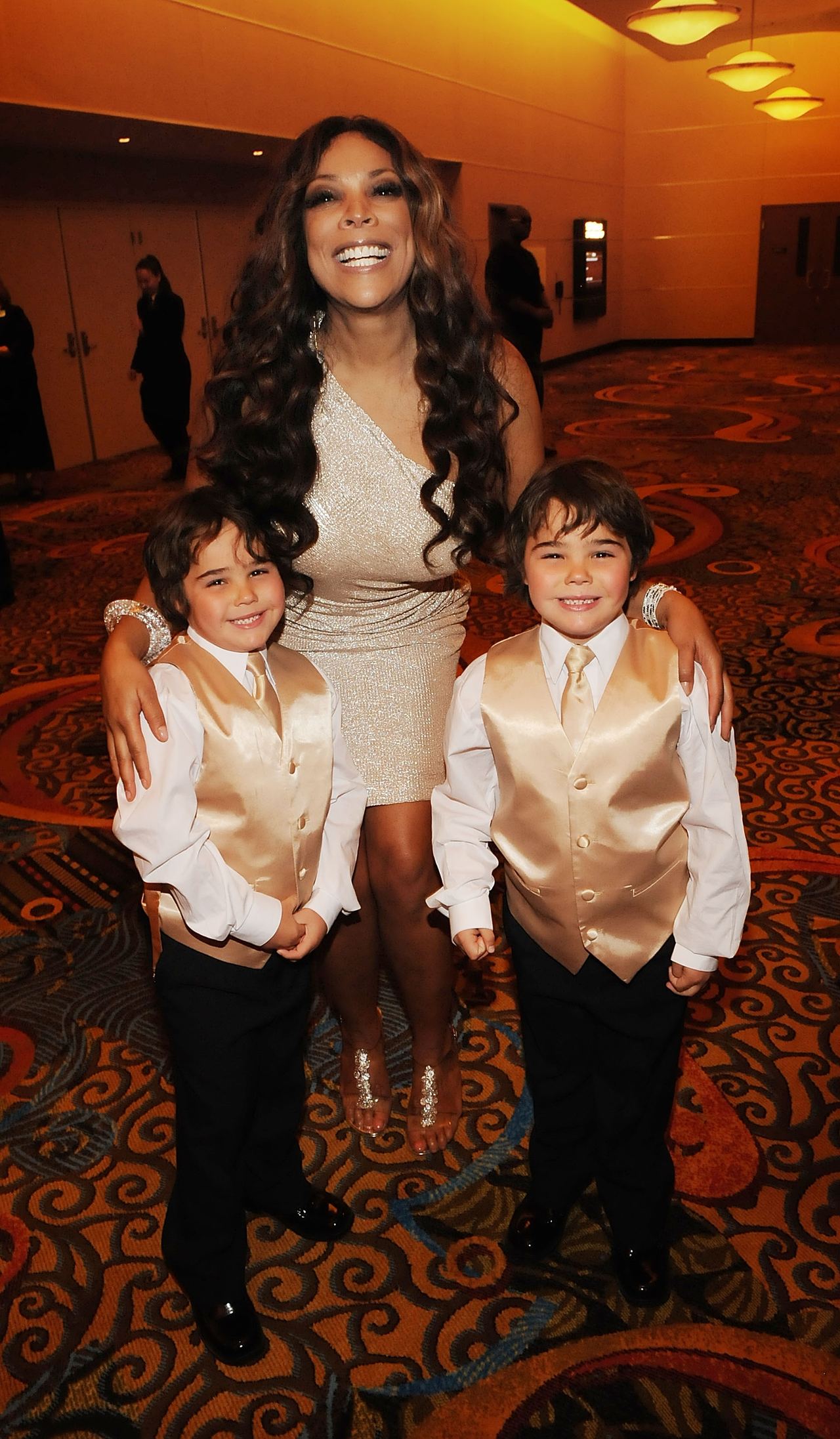 This earlier photo shows Justin and Jordan Rogers as young boys posing with Wendy Williams at an event honoring their father, offering a glimpse of the twins years before their latest birthday photo sparked a debate over the family resemblance. | Source: Getty Images