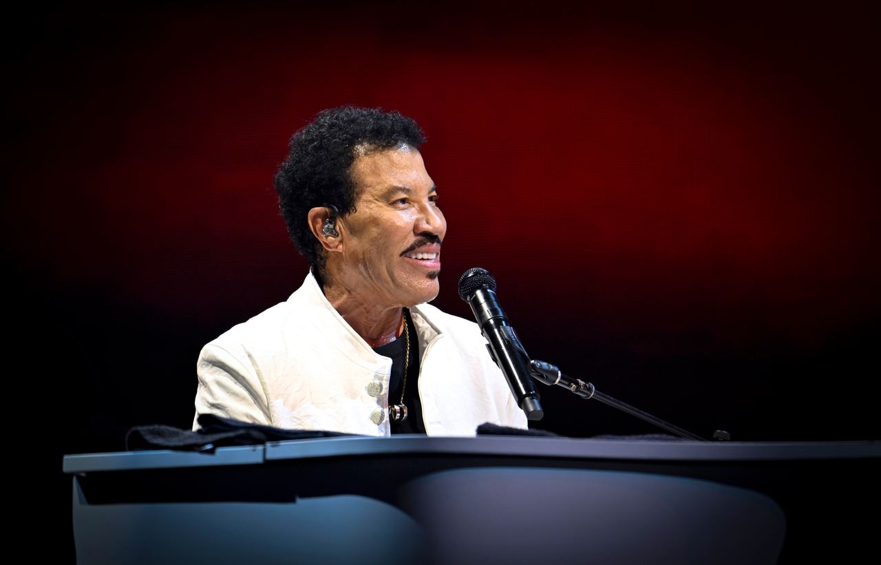 Richie performs during his tour opening in Belfast in May 2025. More than a year later, he told The Muny crowd that he had returned to his doctor for answers and learned he was suffering from dehydration. | Source: Getty Images