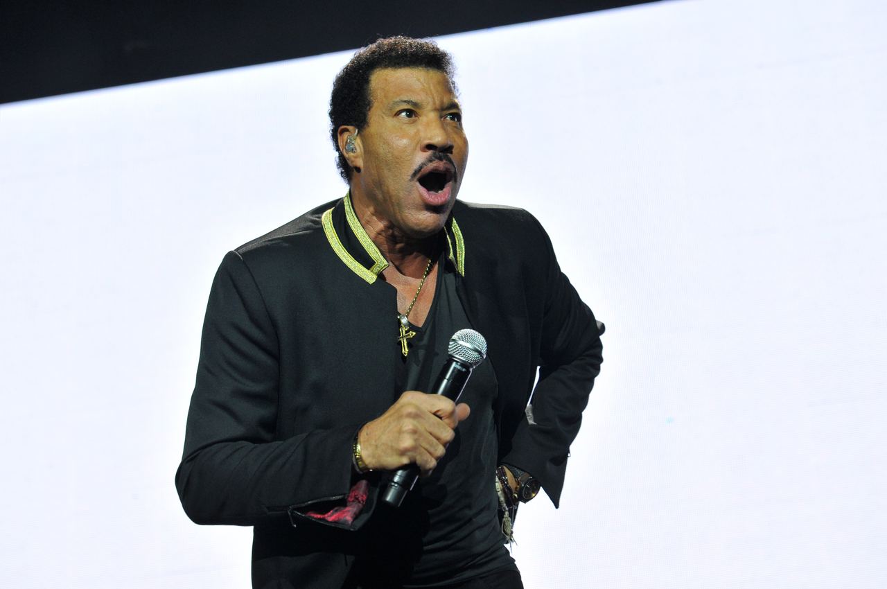 Richie performs onstage in London in 2016, years before his latest tour raised health concerns. At The Muny in August 2026, he needed a chair while performing his final song. | Source: Getty Images