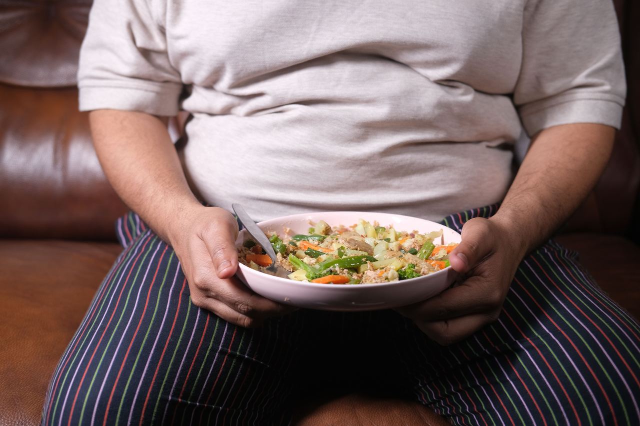 A person holding a plate of food | Source: Pexels