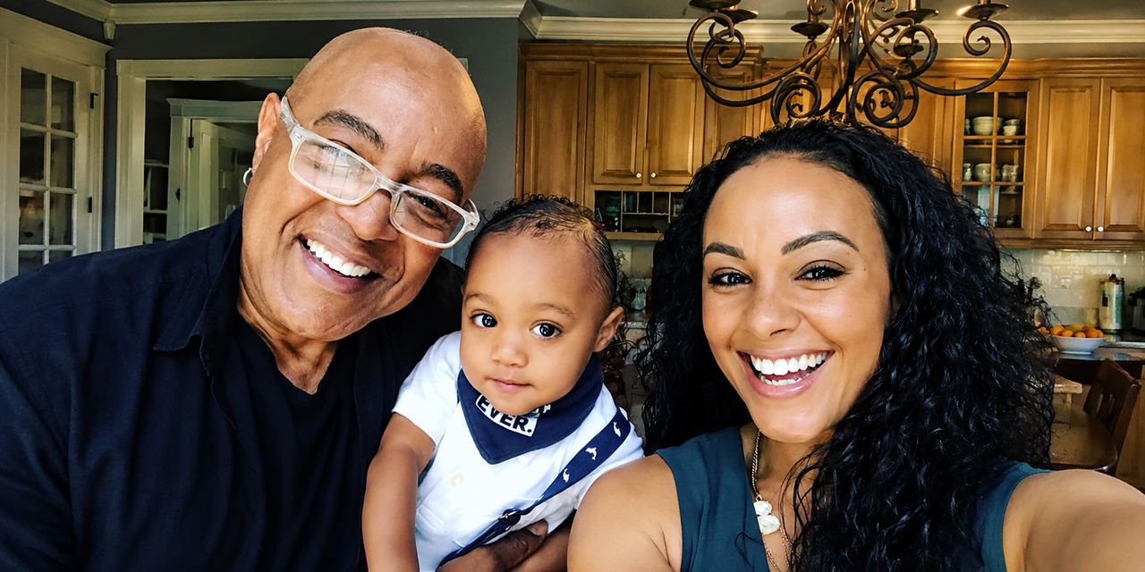 Peabo Bryson, his wife Tanya Bryson and their grandchild | Source: Instagram/tanyabryson411