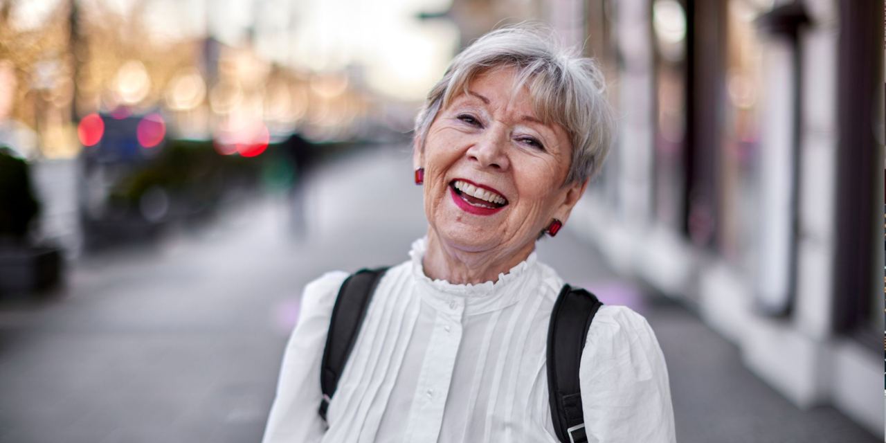 A happy senior woman in the city | Source: Getty Images