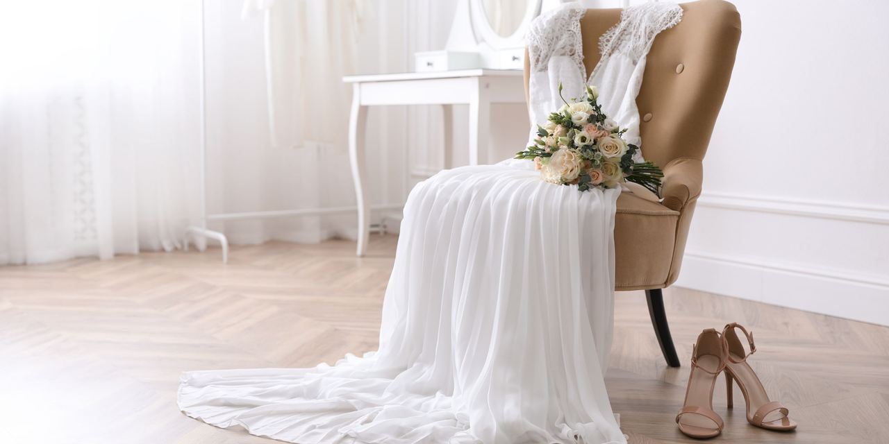 Wedding dress, shoes, and bouquet | Source: Shutterstock