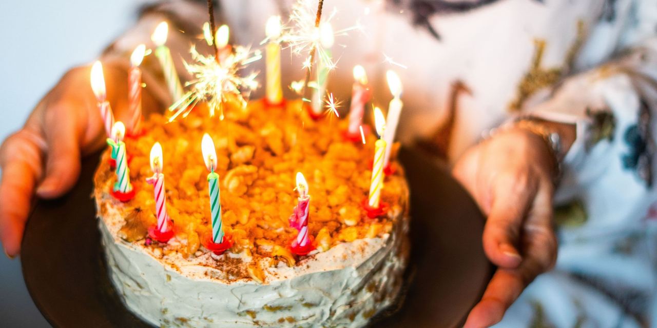 A person holding a birthday cake | Source: Pexels