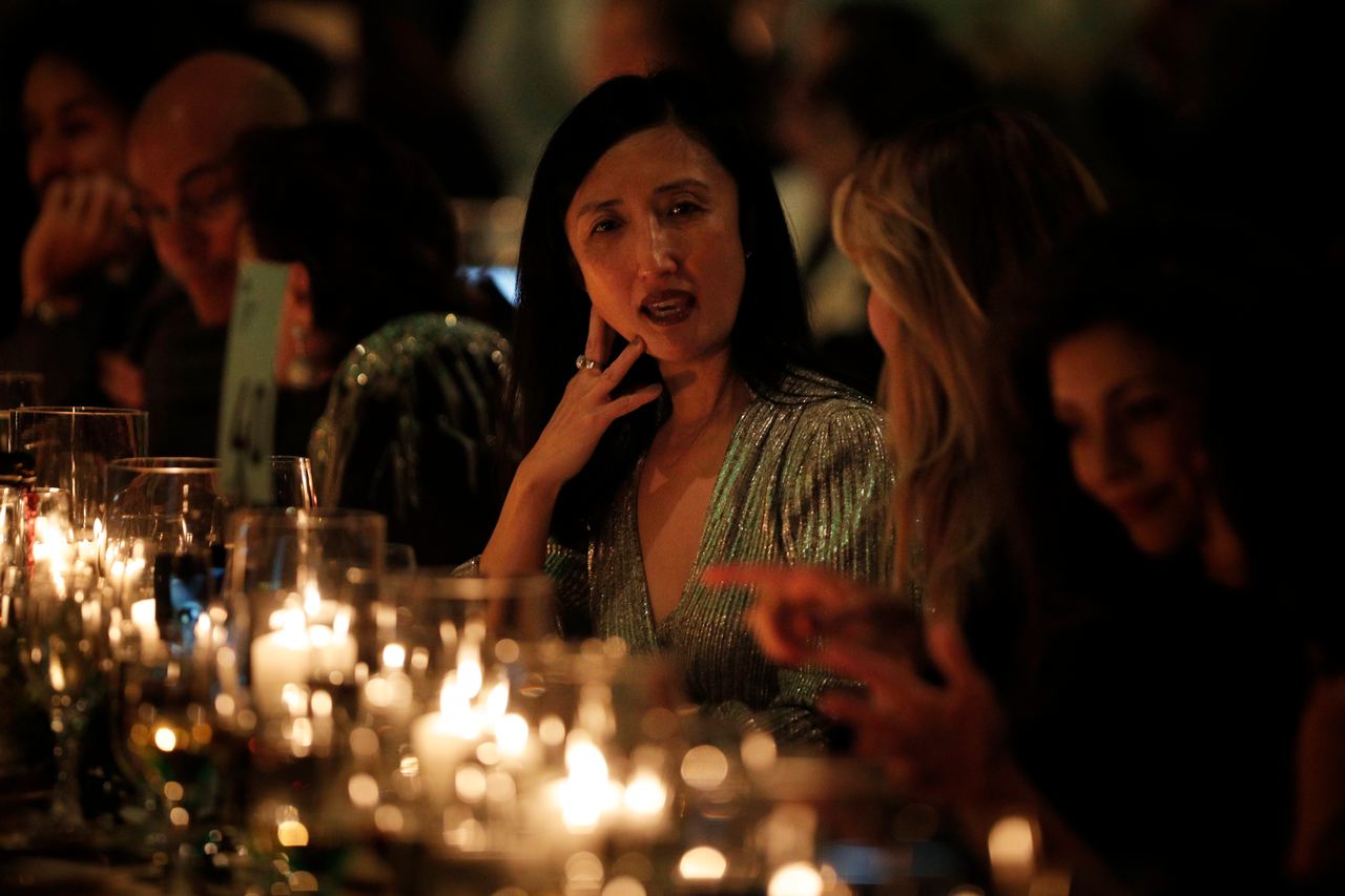 Guests chatting at a dinner event | Source: Getty Images