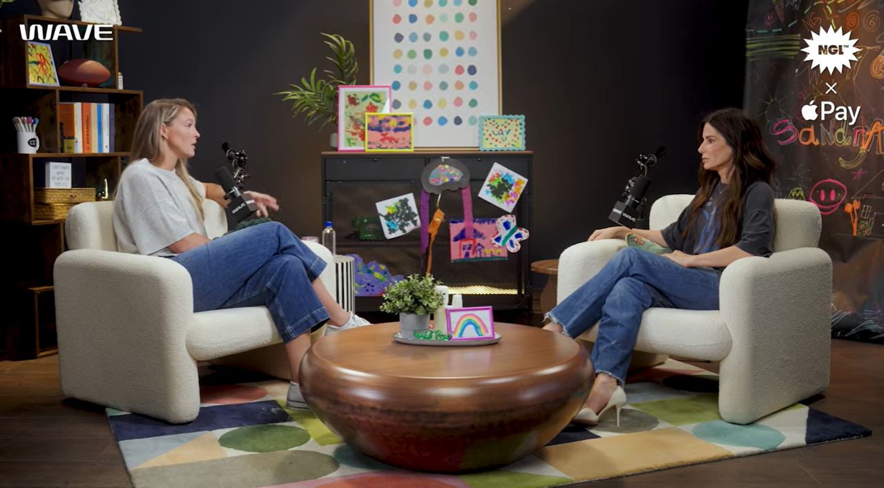 Sandra Bullock spoke with Kylie Kelce on the "Not Gonna Lie" podcast about her daughter Laila's blunt honesty. She recalled how Laila once suggested using a filter to make her look better during a Zoom call. | Source: YouTube/nglwithkylie