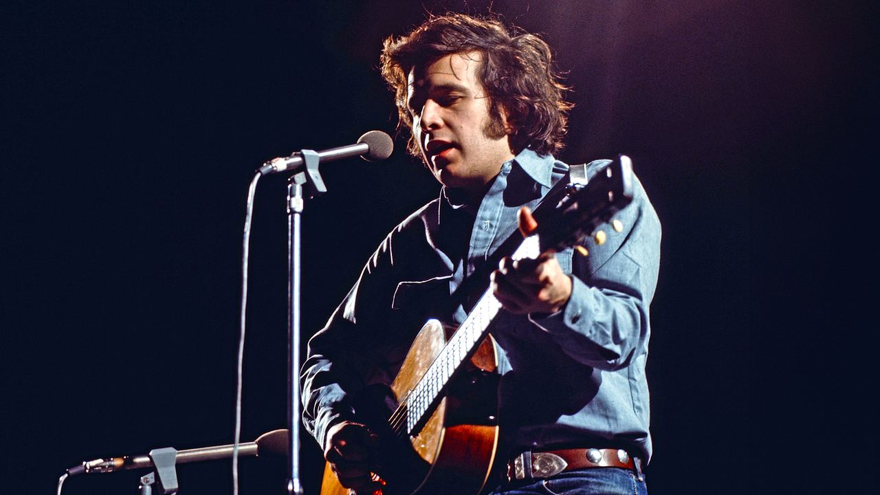 Don McLean onstage with the acoustic guitar that carried one of popular music’s longest number-one singles.
