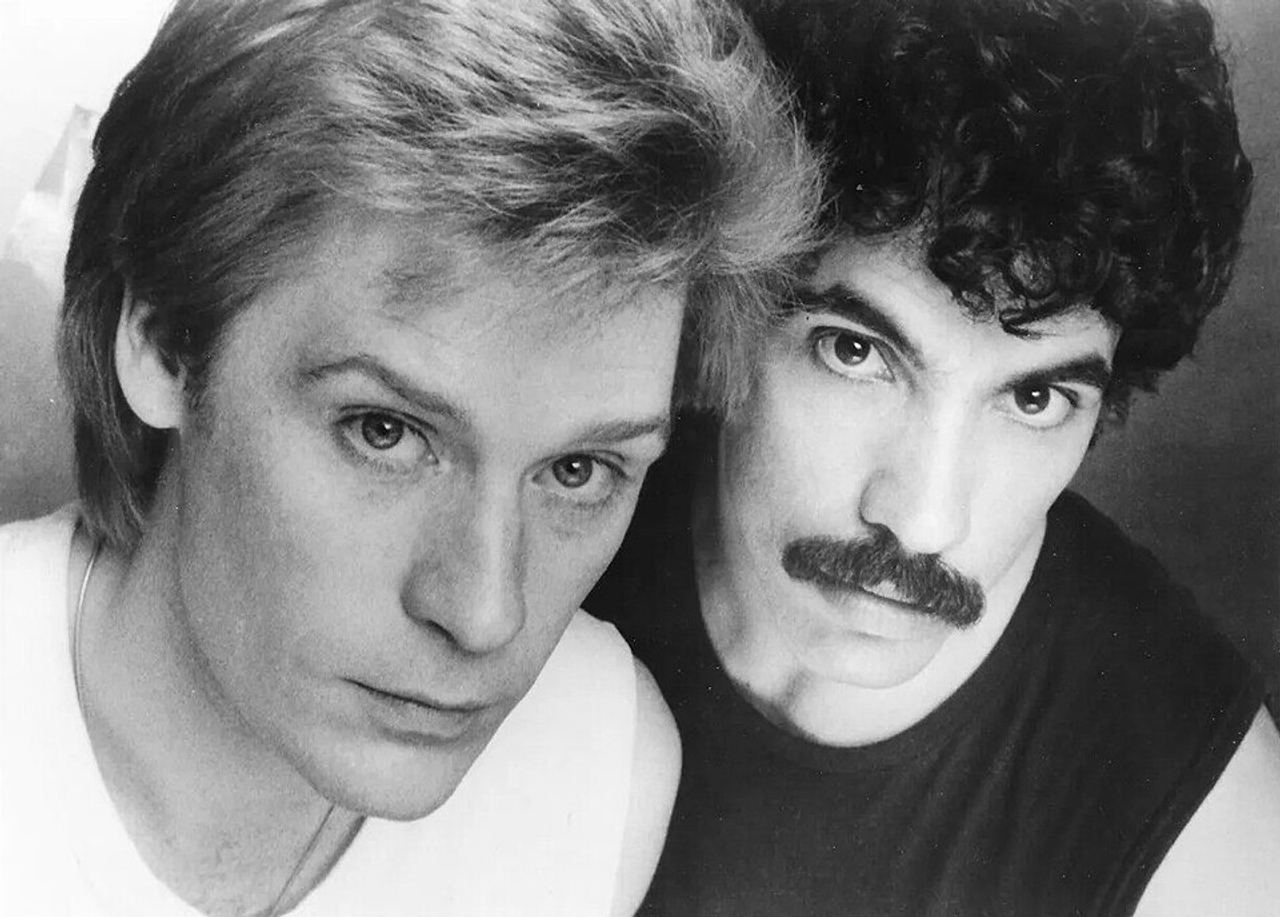 Daryl Hall and John Oates in a separate 1980 RCA publicity photograph for Voices, shown later in their career