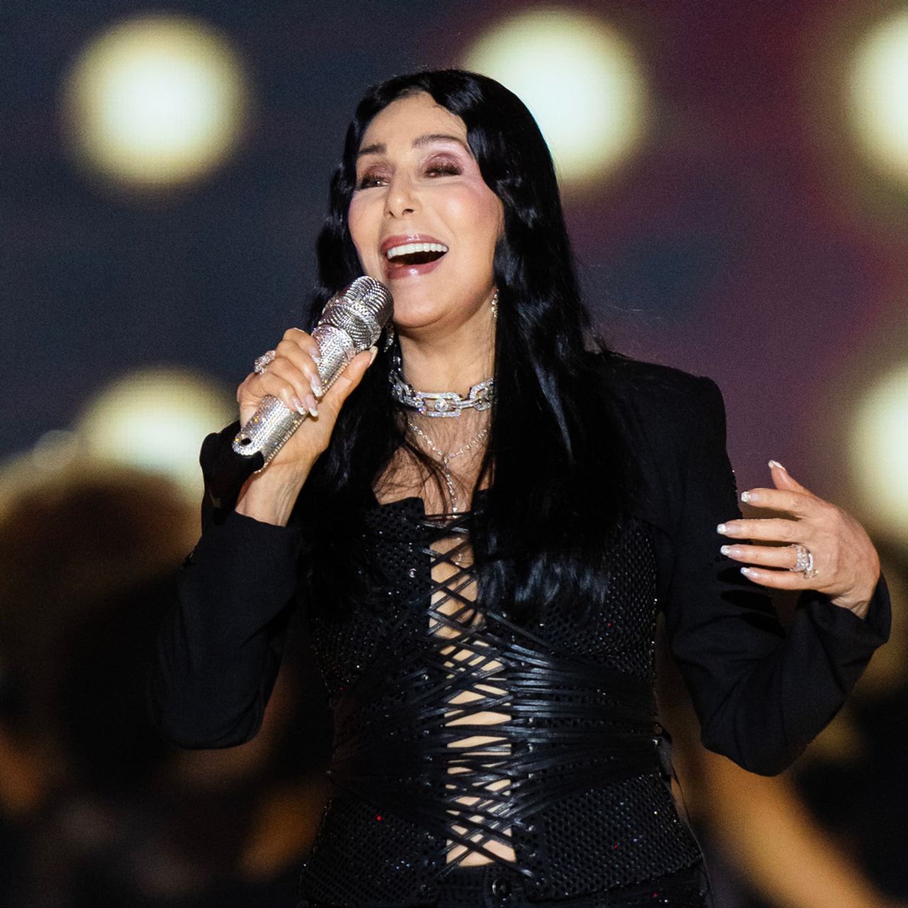Cher performing