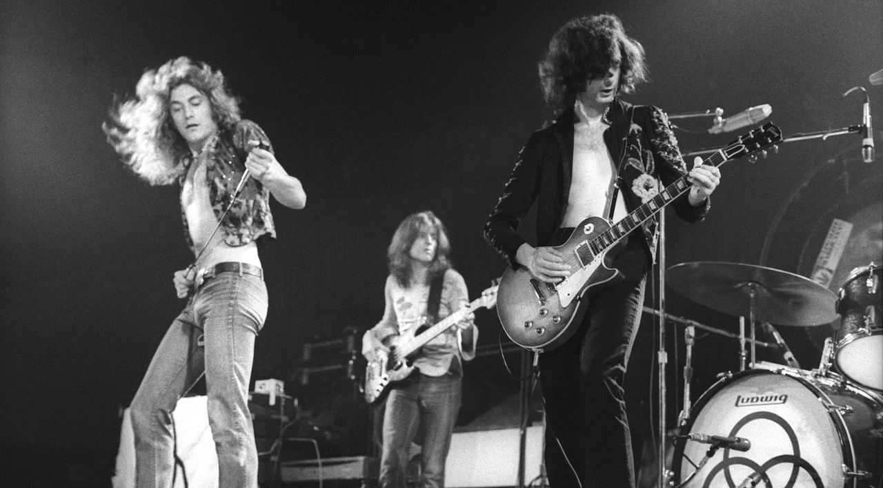 Led Zeppelin performing at the Forum in Los Angeles in 1973. Archive photograph reproduced by Guitar World; this is not the Belfast debut.