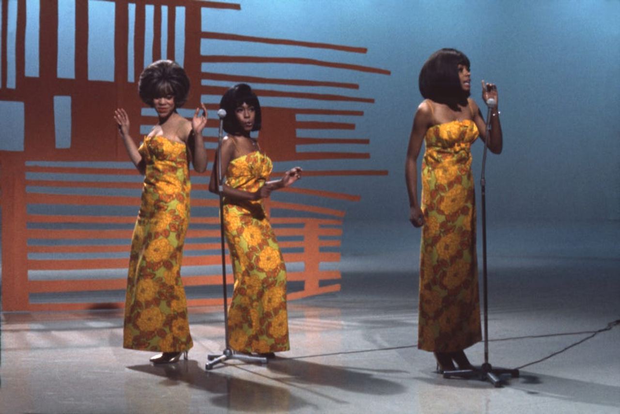 Mary Wilson, Florence Ballard, and Diana Ross performing on television in the 1960s. Archive photograph reproduced by ELLE.