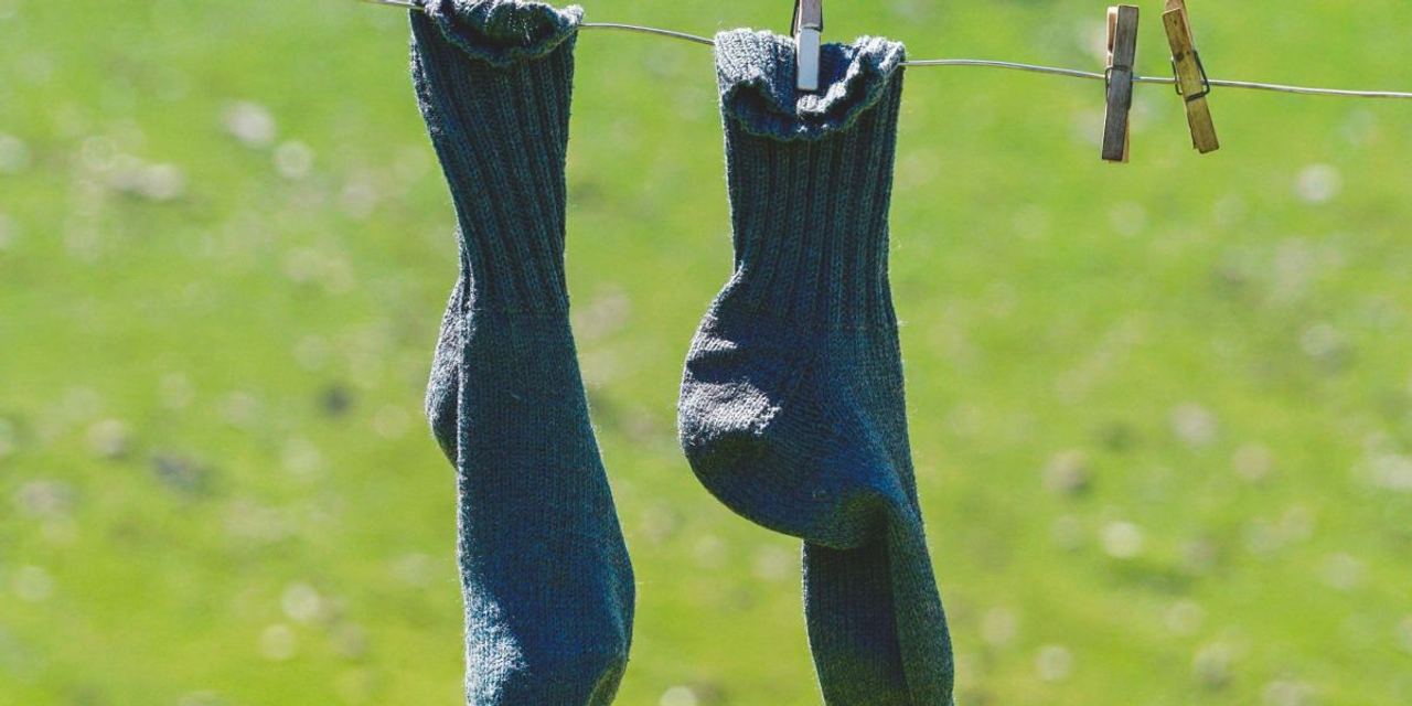 A Man Brought a Bag of His Torn Socks to His Wife's Hospital Bed After She Gave Birth and Said, 'You're Lying Here Anywa