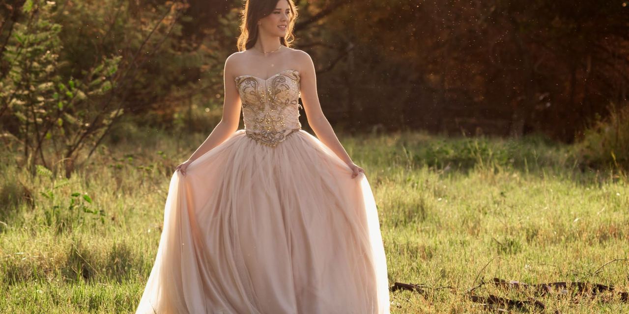 A young woman wearing a gown | Source: Pexels
