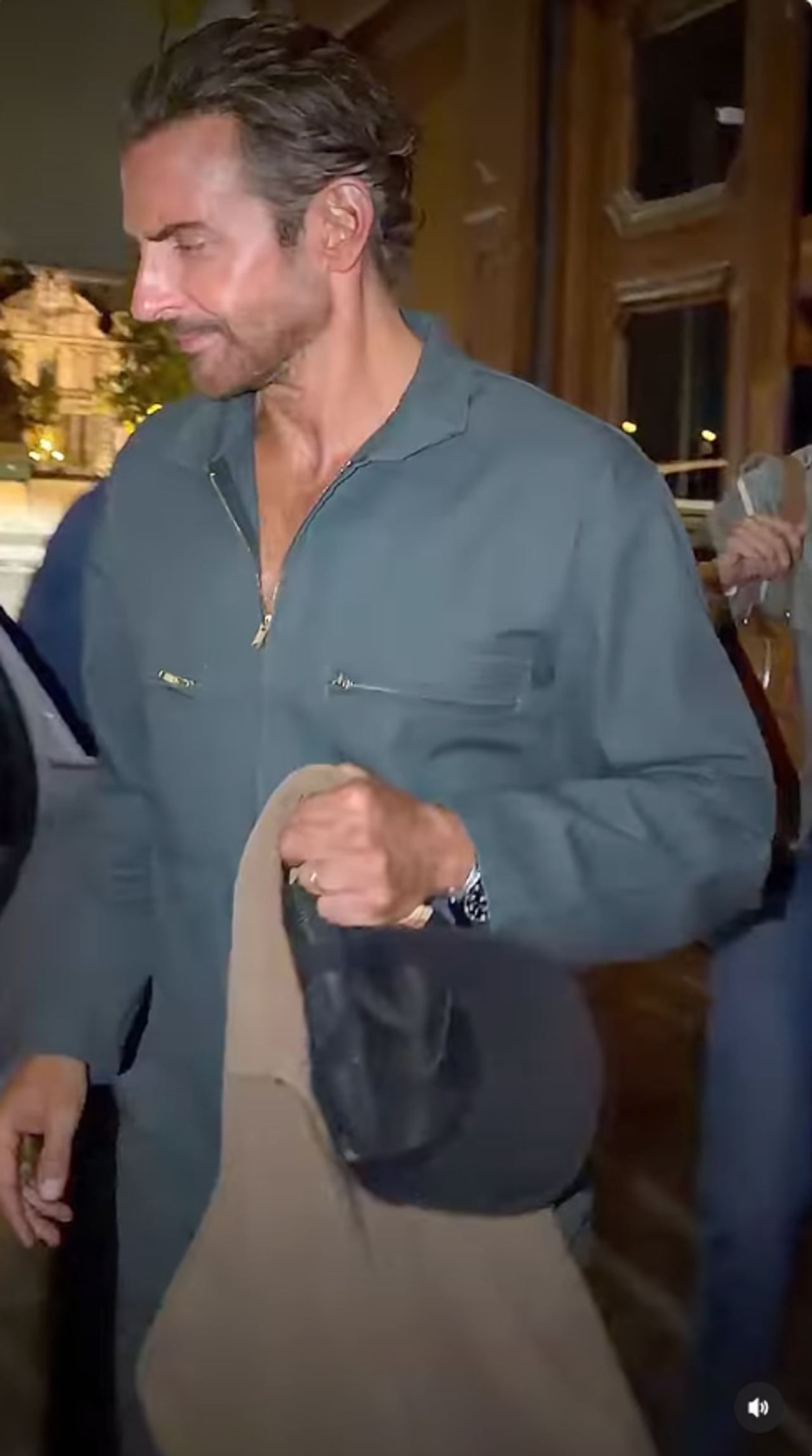 Bradley Cooper leaves the Paris outing carrying a jacket, with the simple band on his left ring finger visible as online speculation swirled over whether the jewelry could have a connection to his late father. | Source: Instagram/thehollywoodpipeline