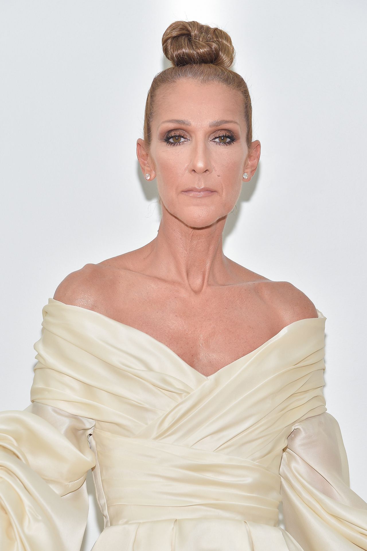 Céline Dion attends the Alexandre Vauthier Haute Couture Fall/Winter 2019-2020 show during Paris Fashion Week on July 2, 2019. Seven years later, she returned to Paris Fashion Week in a different role, taking the L'Oréal Paris runway with a microphone in hand for a live performance. | Source: Getty Images