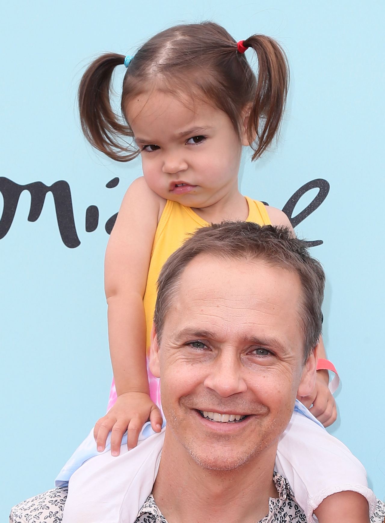 This childhood image captures an early father-daughter moment, years before dance became one of the passions her family and teachers would later remember most vividly. | Source: Getty Images