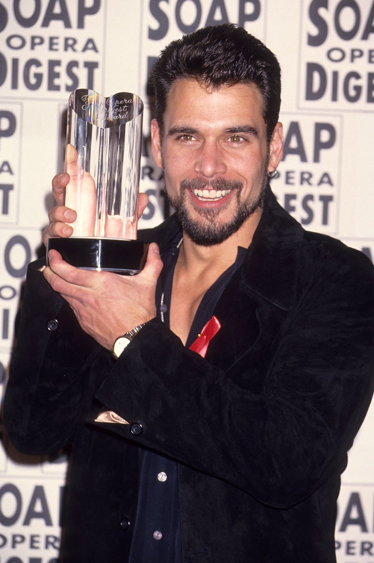 Kelker-Kelly was photographed with a Soap Opera Digest Award in 1994, during the period when he and Rinna were playing Bo and Billie. Their success as an on-screen pair makes Rinna's later description of their off-camera relationship even more striking. | Source: Getty Images