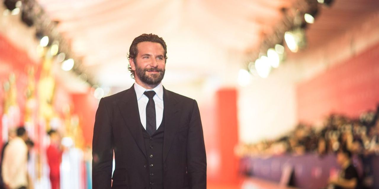 Gigi Hadid, 31, and Bradley Cooper, 51, Step Out in Paris — and Something on Their Left Hands Is Raising Questions — Pho