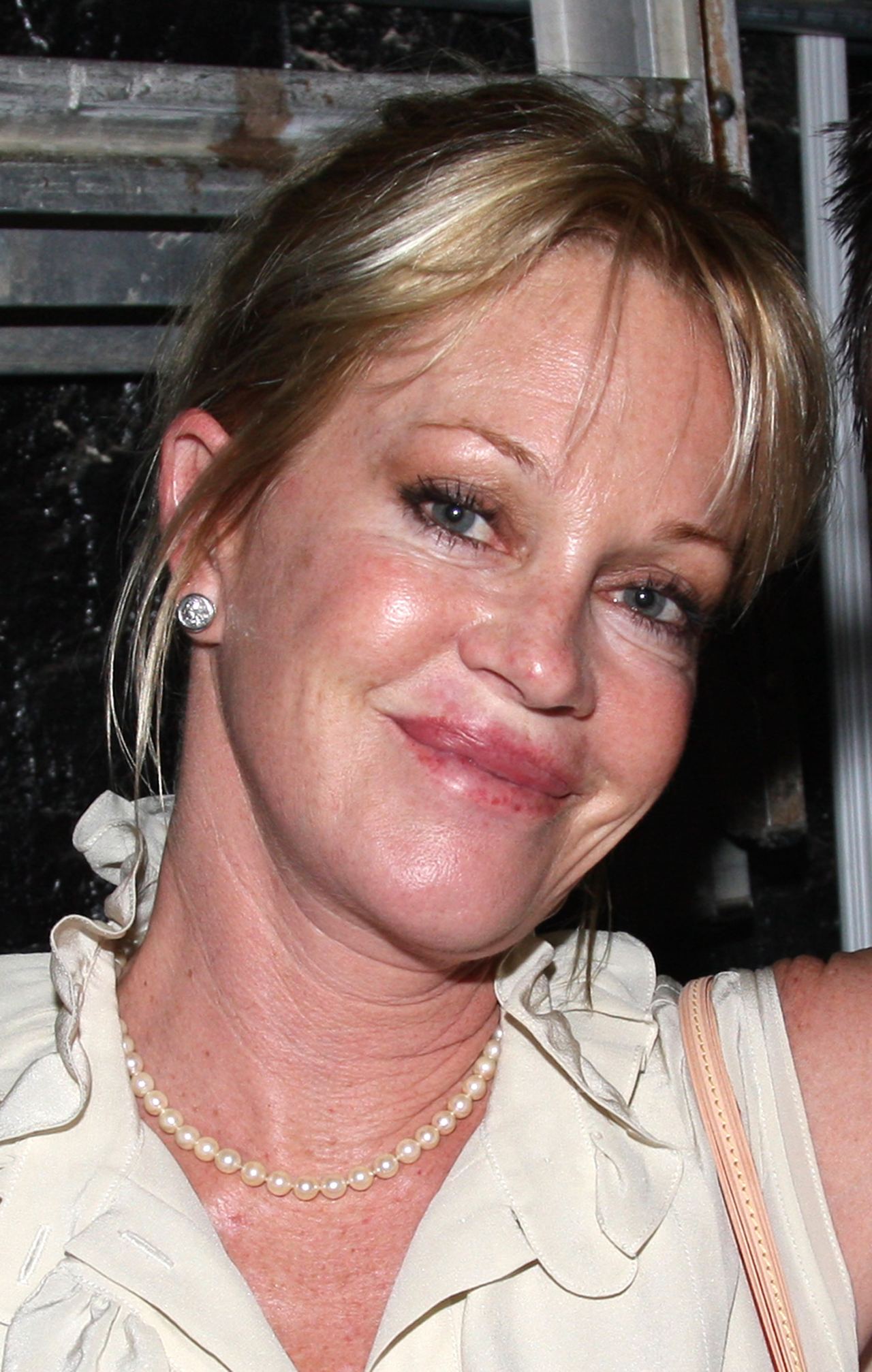 Melanie Griffith poses backstage at the Tony-winning musical "In the Heights" on Broadway in New York City on July 9, 2008 | Source: Getty Images