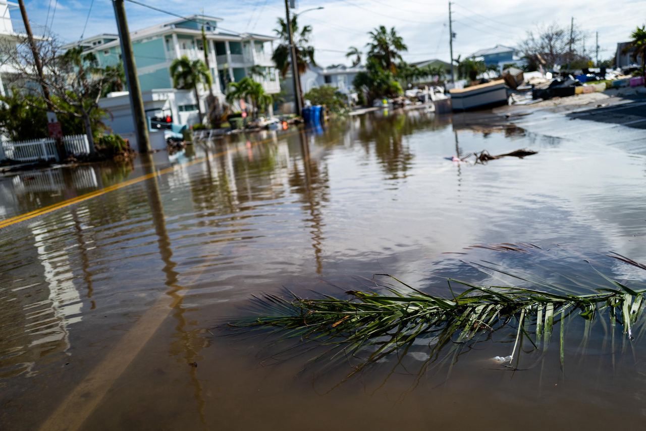 For illustration purposes: Inundated by heavy rainfall and storm surges, neighborhood streets are completely submerged, leaving communities cut off by deep floodwaters. | Source: Getty Image