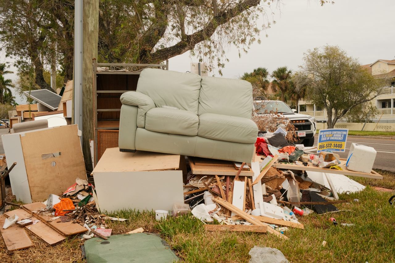 For illustration purposes: Powerful storm conditions leave behind mountains of ruined household items, debris, and destroyed furniture stacked along the streets as residents pick up the pieces. | Source: Getty Image