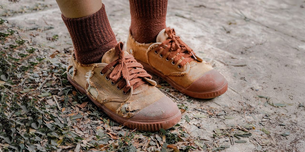 Worn-out shoes | Source: Shutterstock