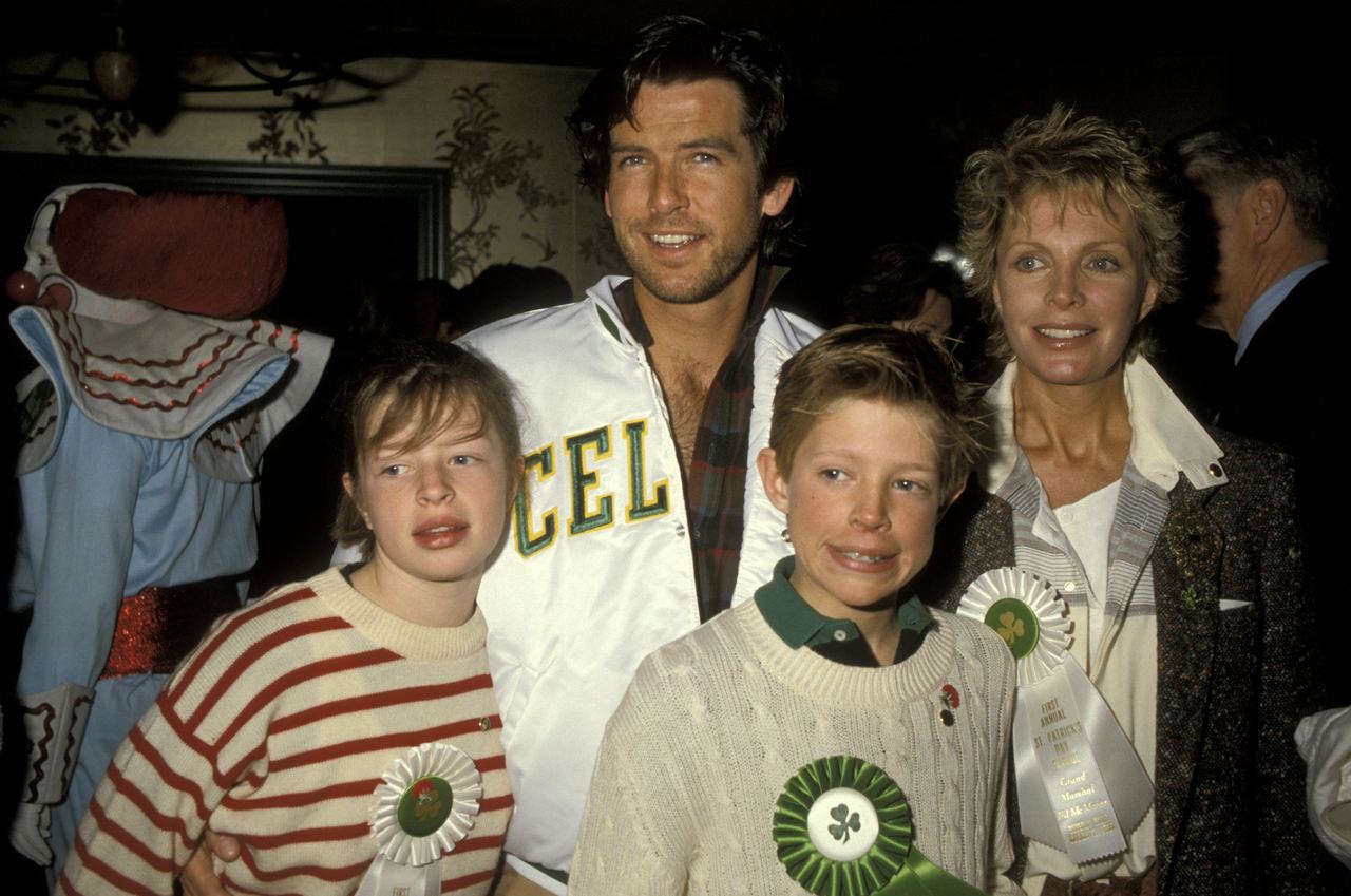 Actor Pierce Brosnan and his wife, Cassandra Harris, with their son, Christopher Harris, and daughter, Charlotte Harris, at 11th Annual People's Choice Awards. / Source: Getty Images