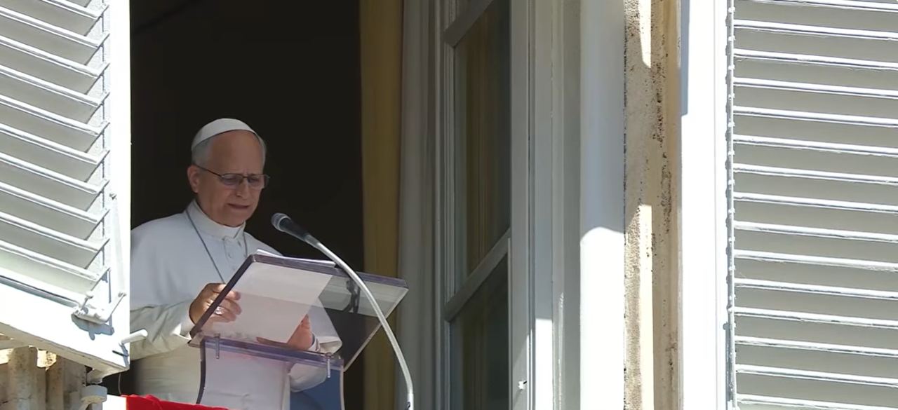 Pope Leo XIV reads from a document during his customary Angelus prayer at the Vatican on Sunday, October 11, 2026, where he revealed that doctors had discovered a small, localized nodule in his lung during recent medical examinations and recommended surgery to remove it. | Source: YouTube/Vatican News - English