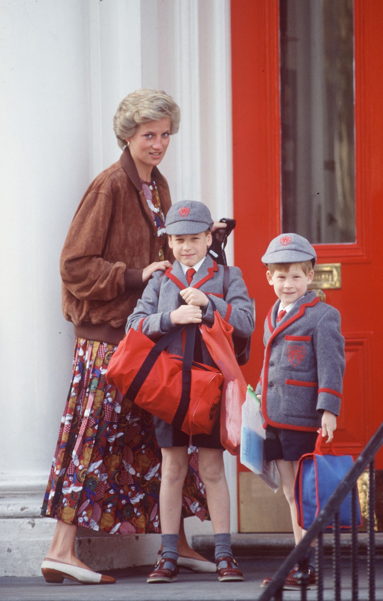 William and Harry headed back to Wetherby School with their mother, Princess Diana, in London in April 1990. As schoolchildren, the brothers used "Wales" as a surname, taking it from their father Charles' title at the time. | Source: Getty Images