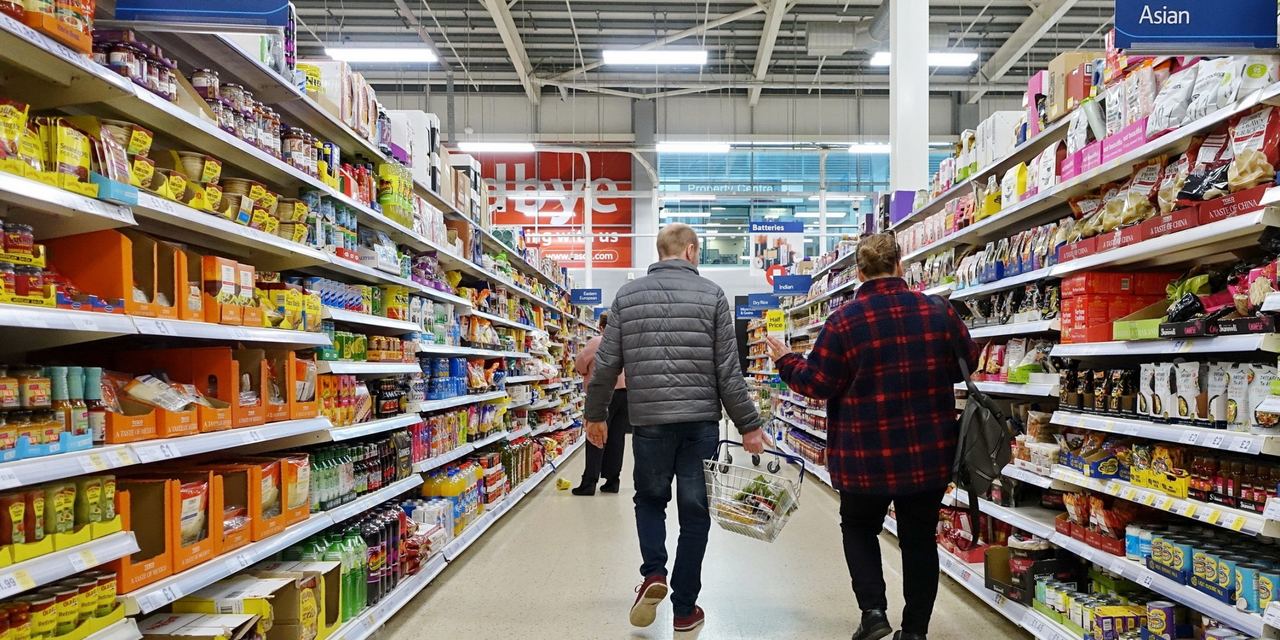 Shoppers browse an aisle | Source: Shutterstock